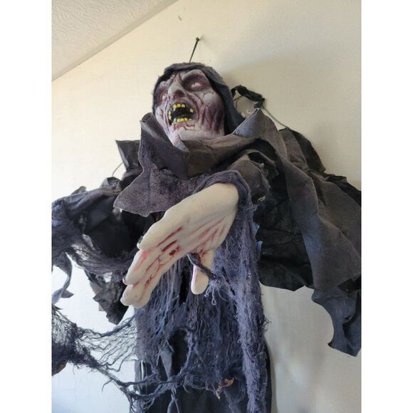 Scary hanging zombie Halloween prop as is GateKeeper...